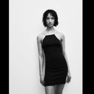 Piped Asymmetric White and Black dress